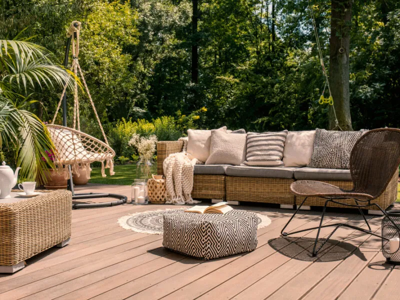 A,Rattan,Patio,Set,Including,A,Sofa,,A,Table,And